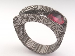 Damascus with Birds Eye pattern and ruby